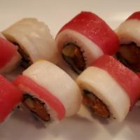 Tuna Extreme Roll · Spicy Tuna, Cucumber, topped with Tuna and White Tuna