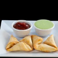 Chicken Samosa (6) · Fried pastries filled with chicken, and spices; served with yogurt chutney.