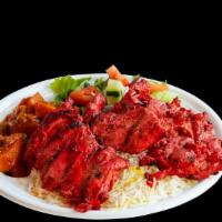 Chicken Tikka · Boneless chicken thighs marinated in special spices and herbs, flame-broiled.