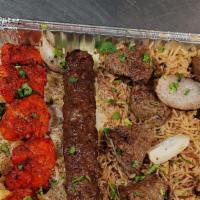 Meat Lovers Combo For Two · One skewer of delicately seasoned and grilled chicken, kofta, lamb, and beef kebab. Greek sa...