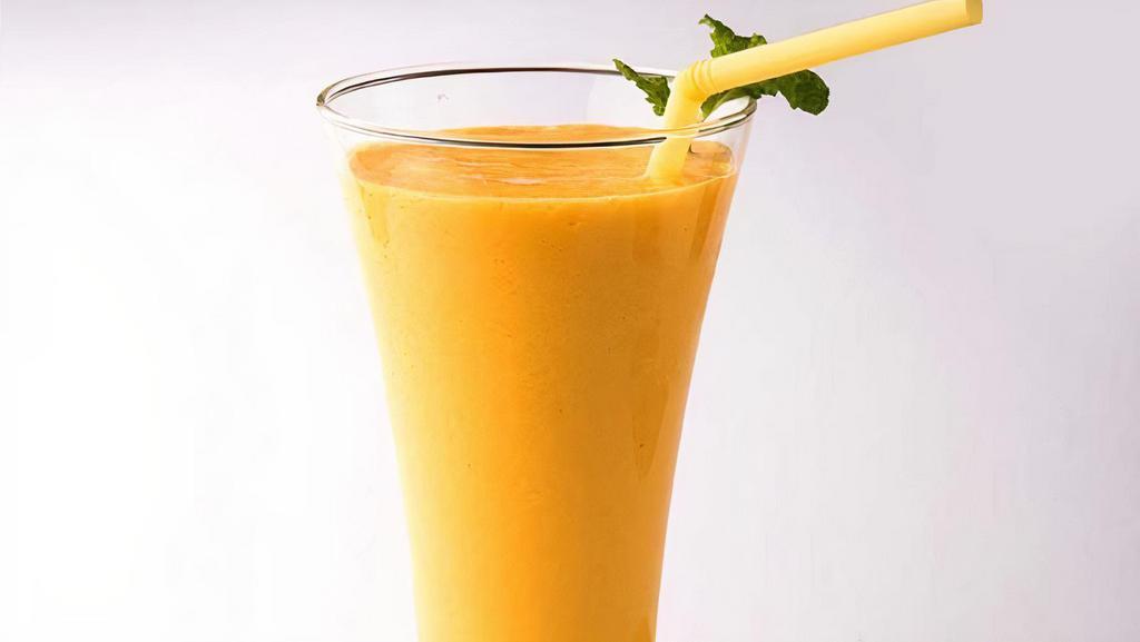 Mango Lassi · Sweet yogurt drink with mango pulp.