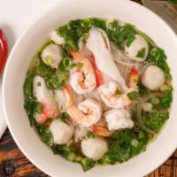 Phở Seafood / · Noodle soup with seafood: shrimp, fish ball, imitation crab meat. Beef, chicken or vegetable...