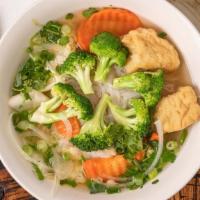 Phở Chay / · Vegetable noodle soup with tofu. Beef, chicken or vegetable broth.