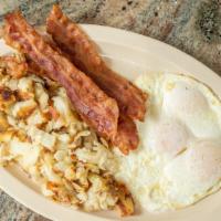 Breakfast Plate · Our breakfast plate is served with 3 eggs, hash browns, toast, and your choice of protein