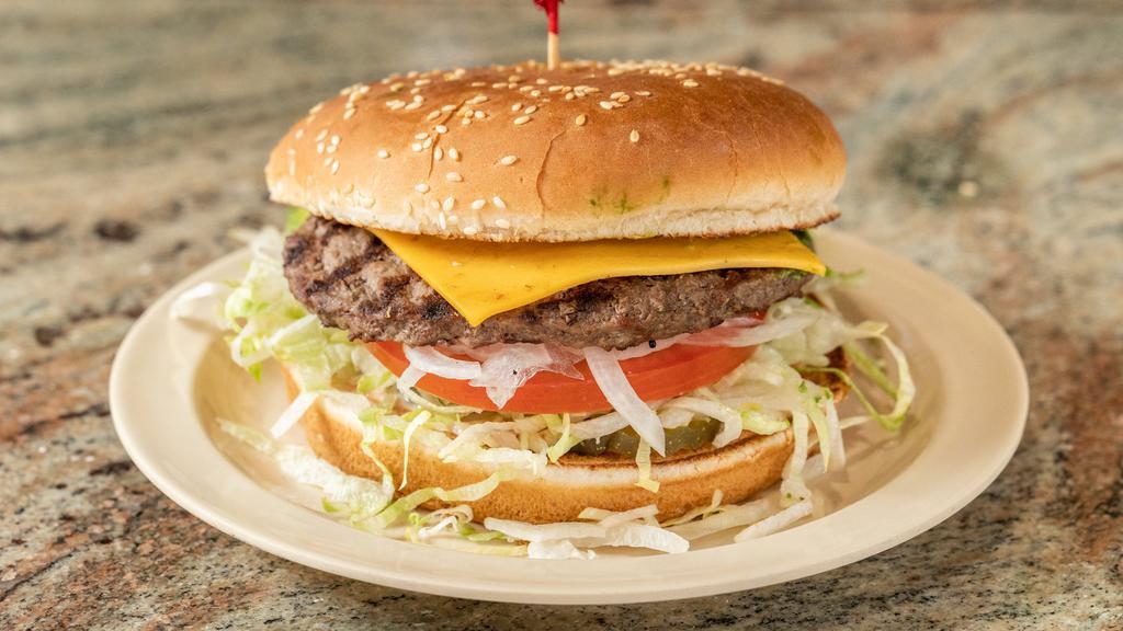 1/4 Lb. Cheeseburger · 1/4  lb. Cheeseburger, served on a sesame seed bun, with our homemade thousand island dressing, onions, chopped lettuce, tomatoes & pickles