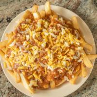 Chili Cheese Fries · Graded Jack & Cheddar Cheese with  TBurgers Famous Home Made Chili