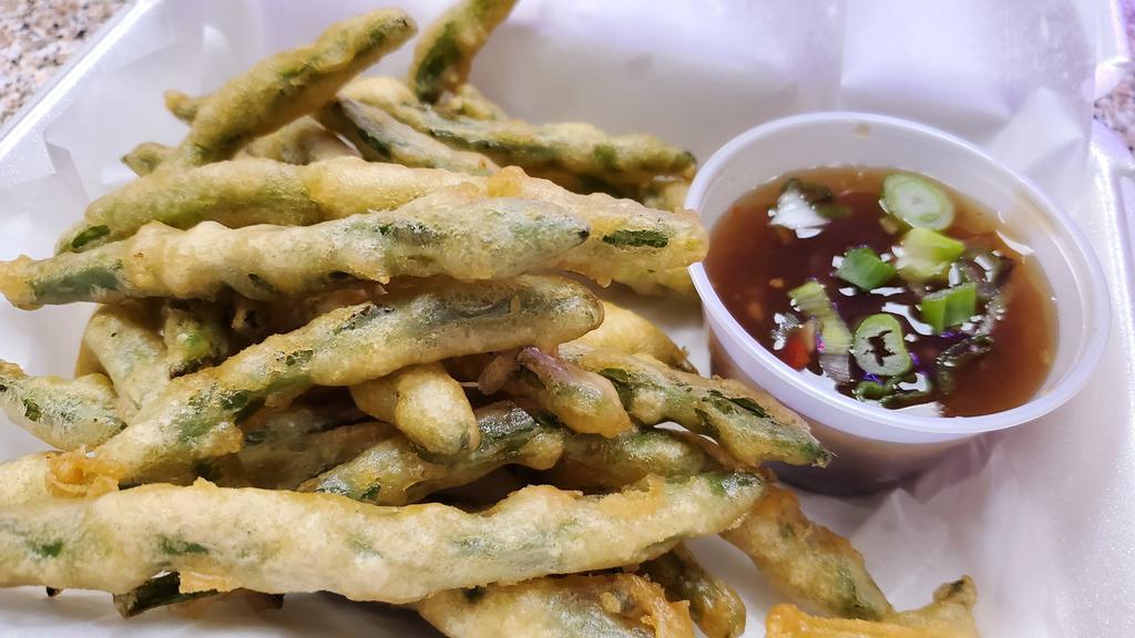 Crispy String Beans · String beans lightly battered and deep fried, served with a spicy bean sauce on the side. Vegetarian.