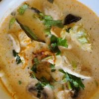 Tom Kha · Thai coconut milk soup with lemongrass, galangal napa, mushrooms, and cilantro.