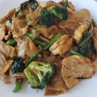 Pad See-Ew · Wide rice noodles stir-fried with broccoli, egg, and black sweet soy sauce. Choice of meat, ...