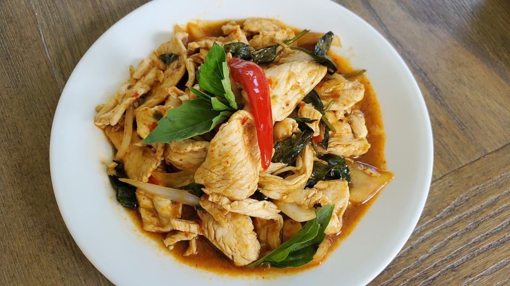 Pad Ka Prow · Stir-fried meat with basil, bell pepper, Thai chilis, and garlic. Choice or meat, tofu, or combination veggies. Comes with a side of Jasmine Rice. Spicy!