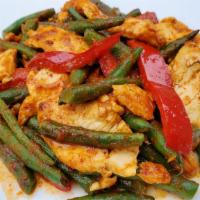 Pad Prik Khing · Stir-fried meat with string beans, spicy curry paste, and black sauce. Choice or meat, tofu,...
