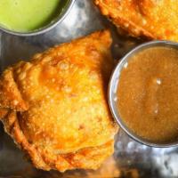 Veg Puff Samosas · Vegan. Two crispy stuffed puffs with curried potato and peas. Served with mint and tamarind