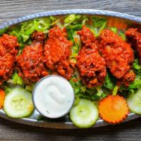 Chicken Masala Wings (5) · Gluten free. Chicken wings marinated in spices and fried. Served with ranch or blue cheese.