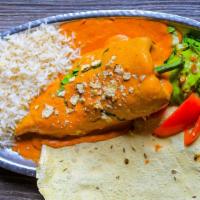 Vegetarian Chili Relleno Plate · Gluten-free. Curried potatoes over tikka masala or millionaires sauce served with rice and g...