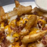 Loaded Bacon Fries · 1 pound of fries, cheddar cheeses, mozz cheese, and bacon.  comes with ranch