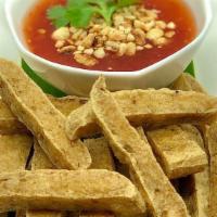 Crispy Tofu · Served with Sweet Chili Sauce topped with Crushed Peanuts.