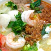 Sukiyaki Lao Style · Glass Noodles, Napa Cabbage, Chinese Broccoli, Celery, Cilantro, Green Onion, Served with La...