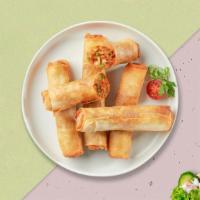 Rock N' Egg Rolls · (2 Pieces) Crispy egg roll stuffed with pork, egg, celery, cabbage. Served with housemade sw...