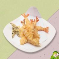 Shrimple Tempura · (4 Pieces) Shrimp in a light coat of tempura batter, deep-fried until crispy with tempura sa...