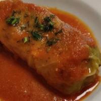 2 Stuffed Cabbage · Served with mashed potato and Sauce.