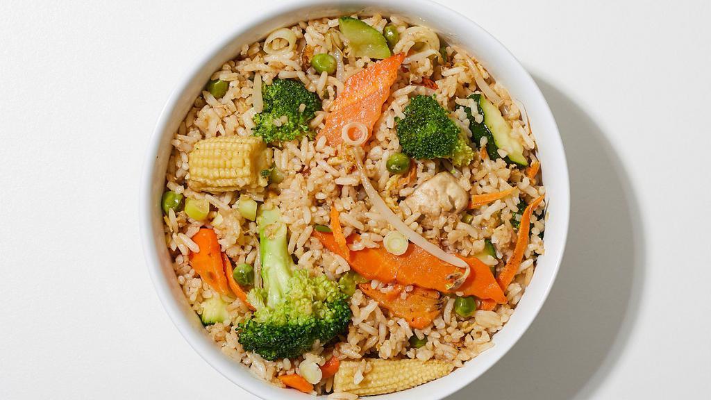 Fried Rice · Authentic fried rice cooked with egg, peas and carrots, green onions.