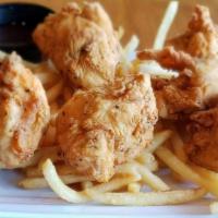 Kid Chicken Bites · Bites of all white meat chicken breast, made Crispy or Grilled. Served with your choice of S...