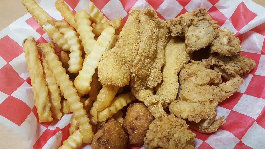 Chicken · Five chicken strips  served with fries and two hush puppies.