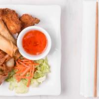 A 4. Fried Platter – Chiên Ba Món · Two egg rolls, two shrimps, five wontons.
Chiên Ba Món