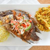 Whole Fried Tilpia Fish · Flavorful whole bone in tilapia fish marinated in assorted spices and deep fried to perfecti...