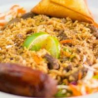 Beef Pilau Rice · Fragrant Basmati rice cooked in a sauce with fresh herbs and our house spice blend with deli...