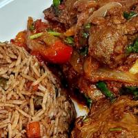 Lamb Stir Fry · Tender flavorful bone in lamb cubes marinated in assorted herbs and spices and sautéed with ...
