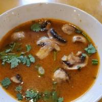 Tom Yum · Mild. Hot and sour lemongrass soup with mushrooms.