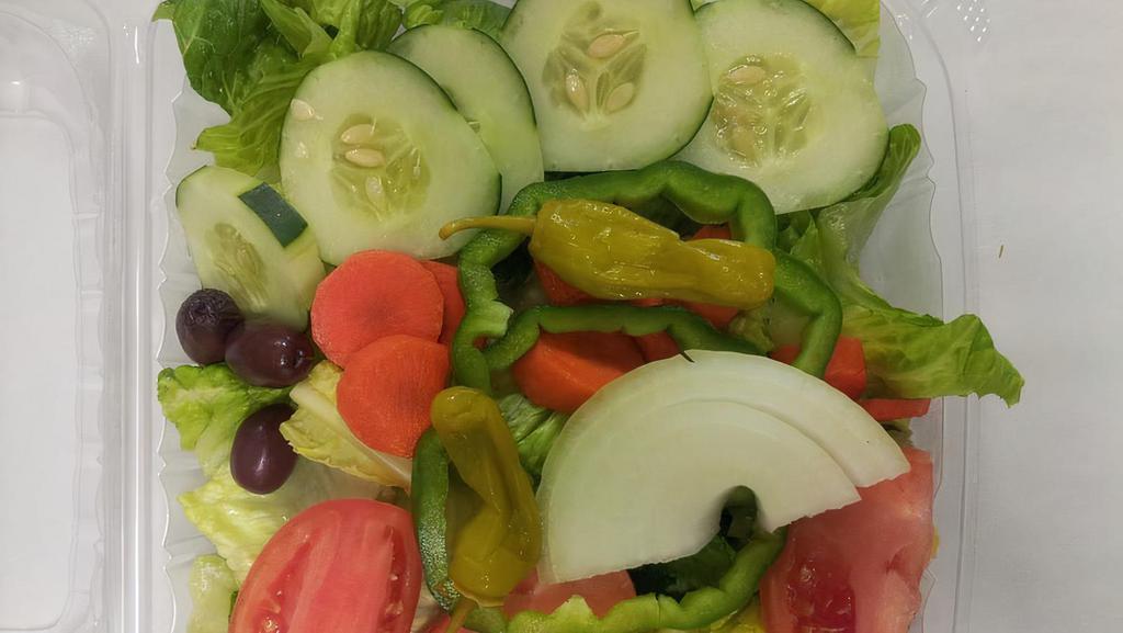 Garden Salad · Lettuce, tomato, cucumber, onion, olives, banana peppers.