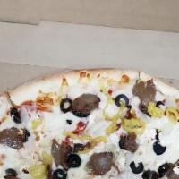 Greek Pizza · Onion, black olives, banana peppers, feta cheese, and gyro meat.