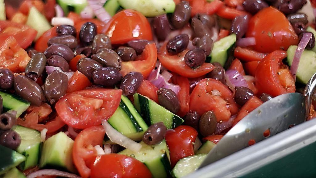 Sicilian Salad · Green beans, purple onions, Kalamata olives, tomatoes, cucumbers, potatoes, seasoned and marinated in oil and red wine vinegar.
