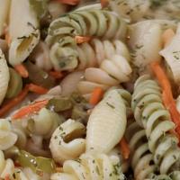 Pasta Salad · Mixed pasta, carrots, and olives seasoned and marinated in a golden Italian dressing.