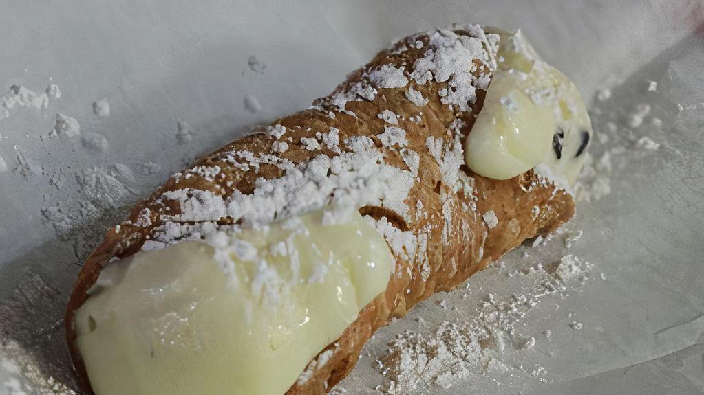 Cannoli · Traditional Italian pastry with a sweet creamy filling.