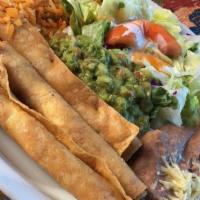 Flautas · Crispy flautas your choice of beef, chicken or shrimp; served with salad, rice, beans, guaca...
