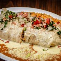 Burrito Norteño Steak · Rice and beans topped with melted cheese and pico de gallo