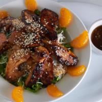 Famous Chinese Chicken Salad · Chicken, rice noodles, mandarin oranges, sesame seed dressing on the side choice of grilled ...
