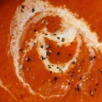 Tomato Soup · A creamy concoction flavored with fresh ginger and cumin.