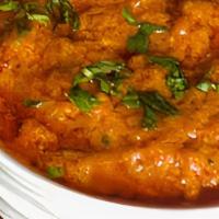 Chicken Curry Masala · Traditional old fashioned curry sauce with onions, tomatoes, and spices.
