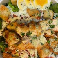 Wingman Cobb Salad · Lettuce, red onion, tomatoes, cheese, croutons, egg, chicken, and cucumber ranch.