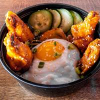 Rice Bowl · Steamed rice, kimchi, pickled cucumbers, sunny side up egg, and 4 cluckin' good wings.