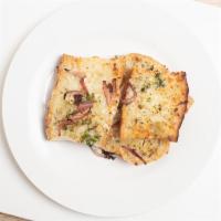 Garlic Bread · Toasted with fresh garlic, herbs & provolone cheese.