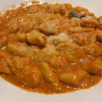 Gnocchi Pomodoro · Homemade artisan potato pasta dumplings in a light tomato sauce with basil.