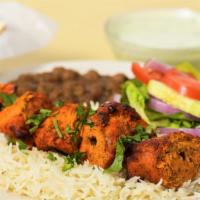 Chicken Tikka · Boneless chicken chunks are marinated in spices and prepared in tandoor.