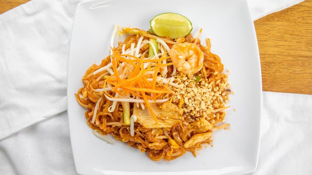 Pad Thai · Thai style pad thai with egg, bean sprouts, scallions and topped with peanut sauce.