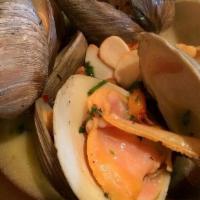 1/2 Dozen Clams Steamed · steamed with white wine, herb butter.