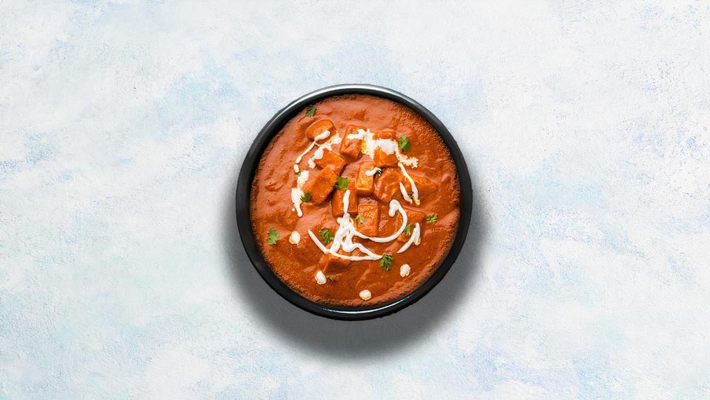 Paneer Makhani · Fresh cottage cheese simmered in a rich creamy tomato, onion and cashew based gravy and topped with cream and butter. Served with a portion of aromatic basmati rice.